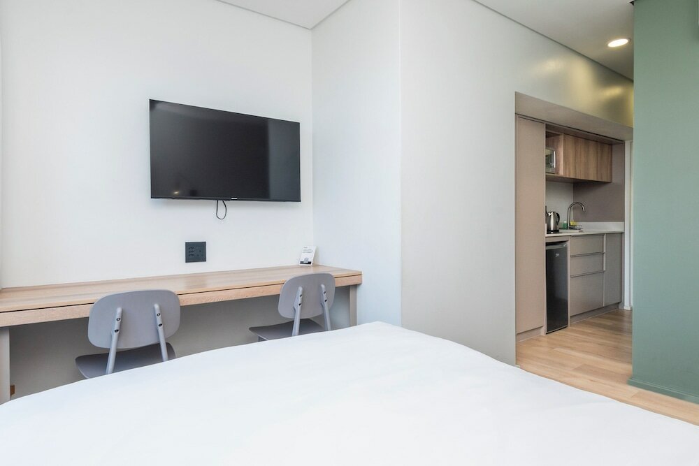 Фото Habitat Aparthotel by Totalstay