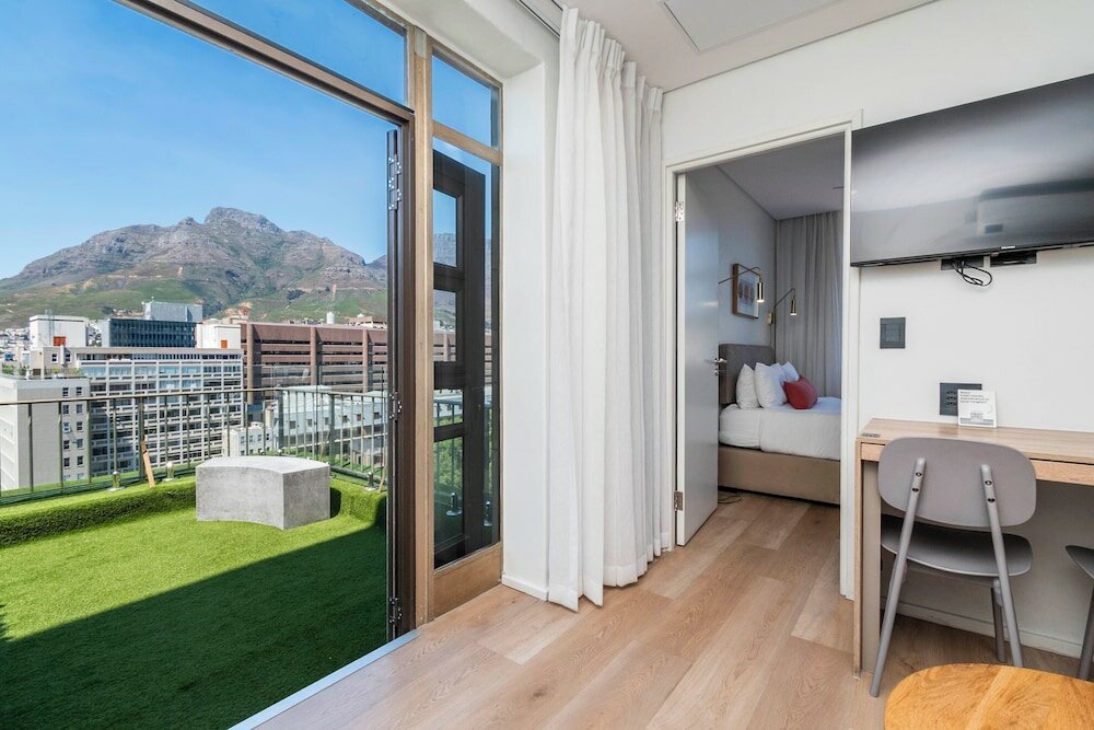 Фото Habitat Aparthotel by Totalstay