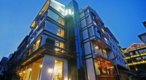 Гостиница South Mountain Boutique Hotel в Хунани