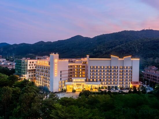 Фото Auden International Hotel