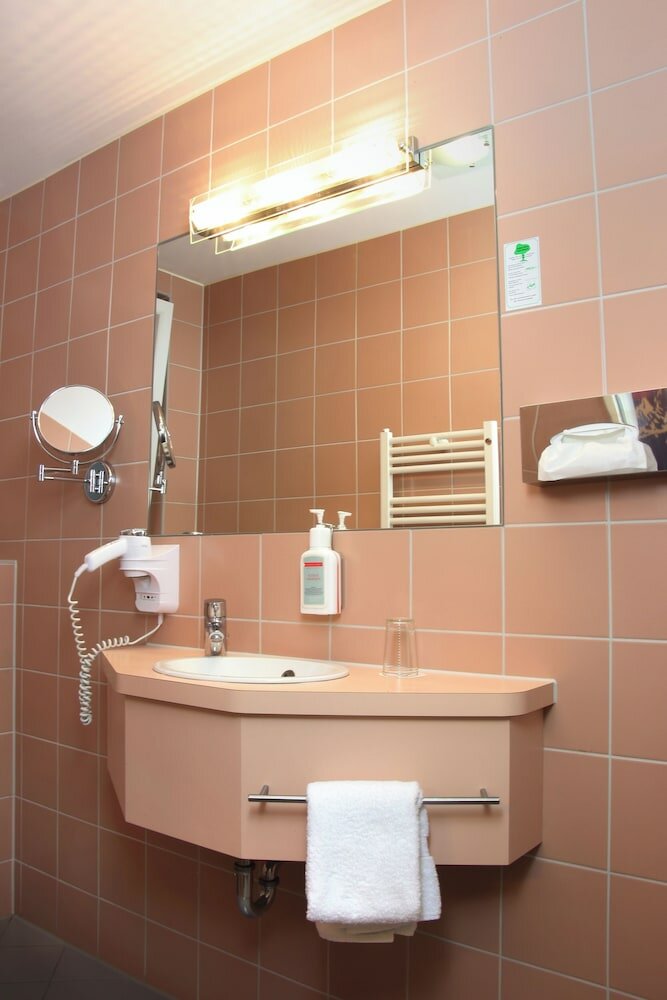 Фото Helvetia Hotel Munich City Center