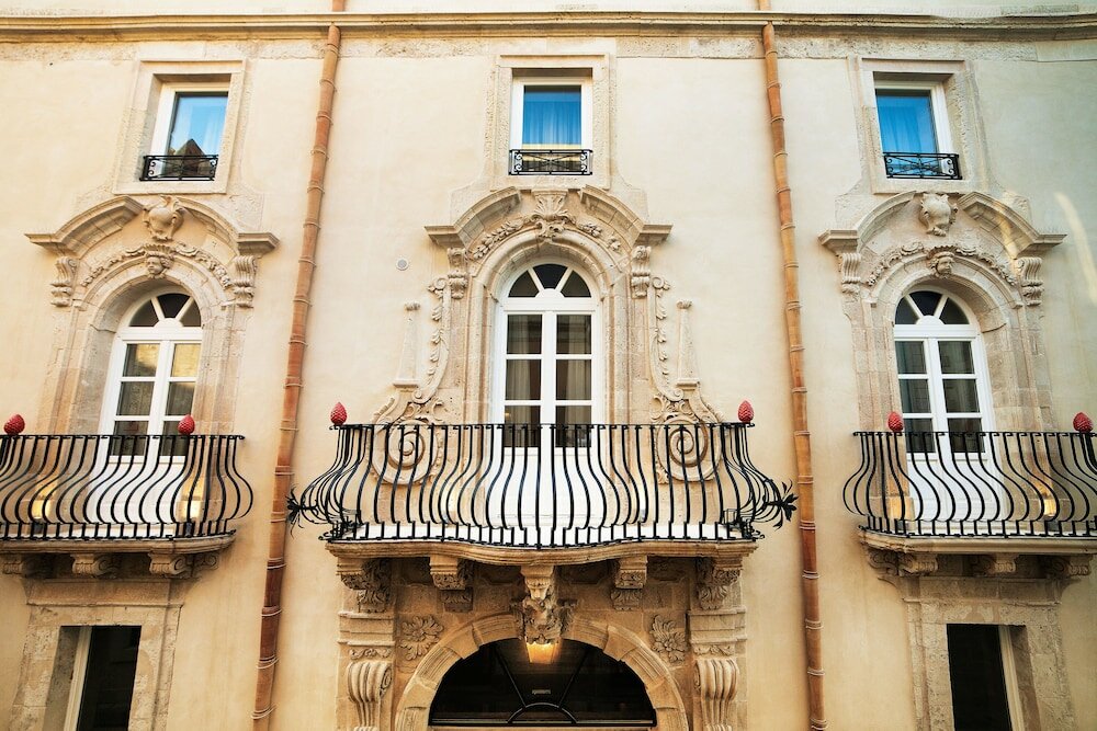 Фото Algila' Ortigia Charme Hotel