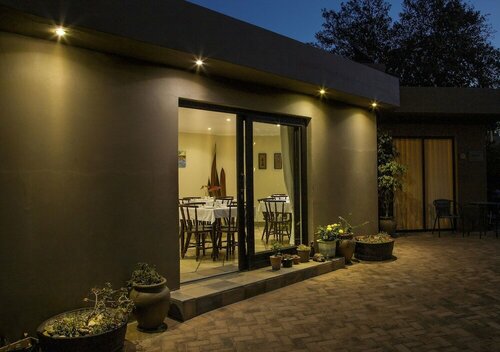Гостиница Lalapanzi Guest Lodge в Порт-Элизабет