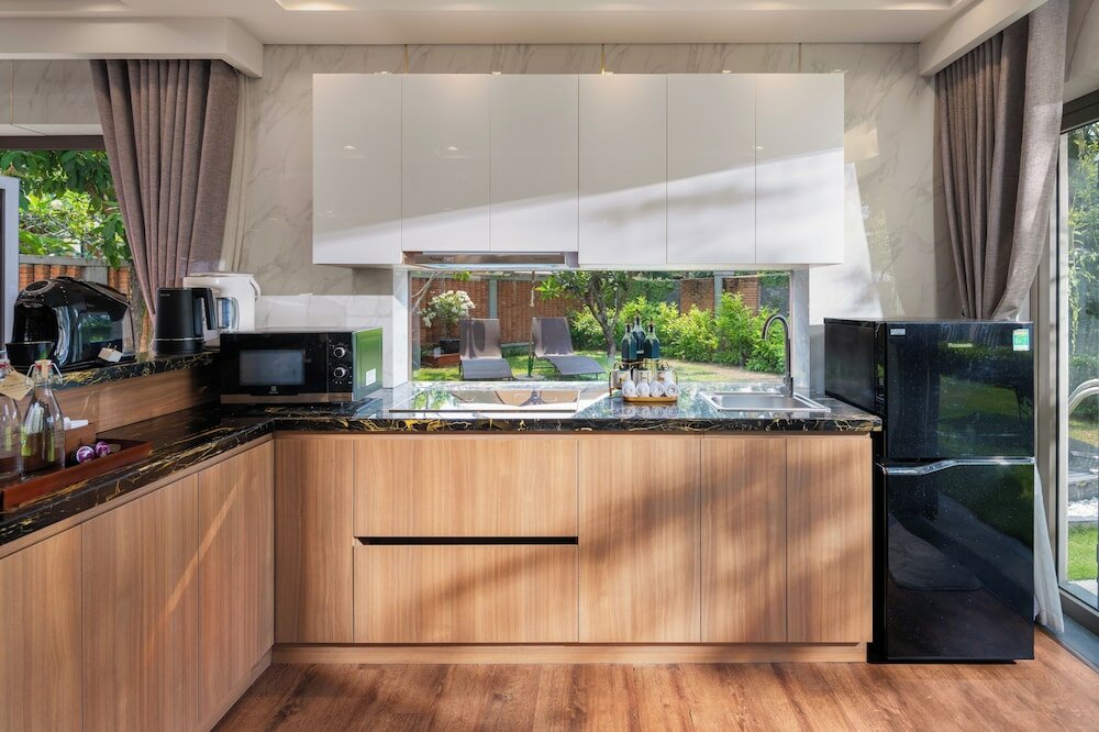 Фото Silk Sense Hoi An River Resort