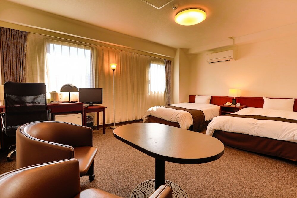 Фото Kochi Sunrise Hotel