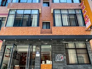 отель Zhangjiajie Caiyuan Weijia Inn