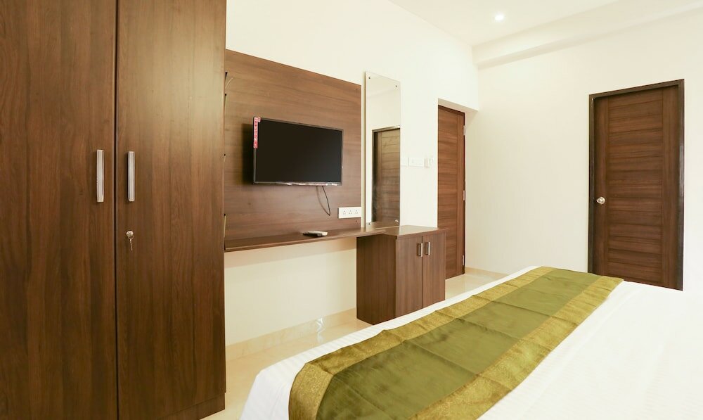 Фото Treebo Trend Hi Line Apartments