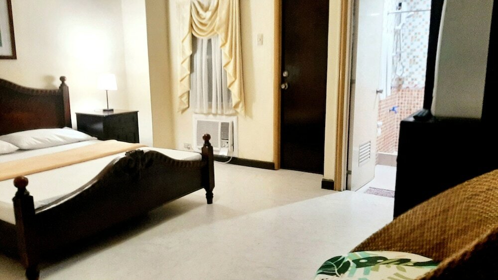 Фото Casa Micarosa Hotel and Residences by RedDoorz