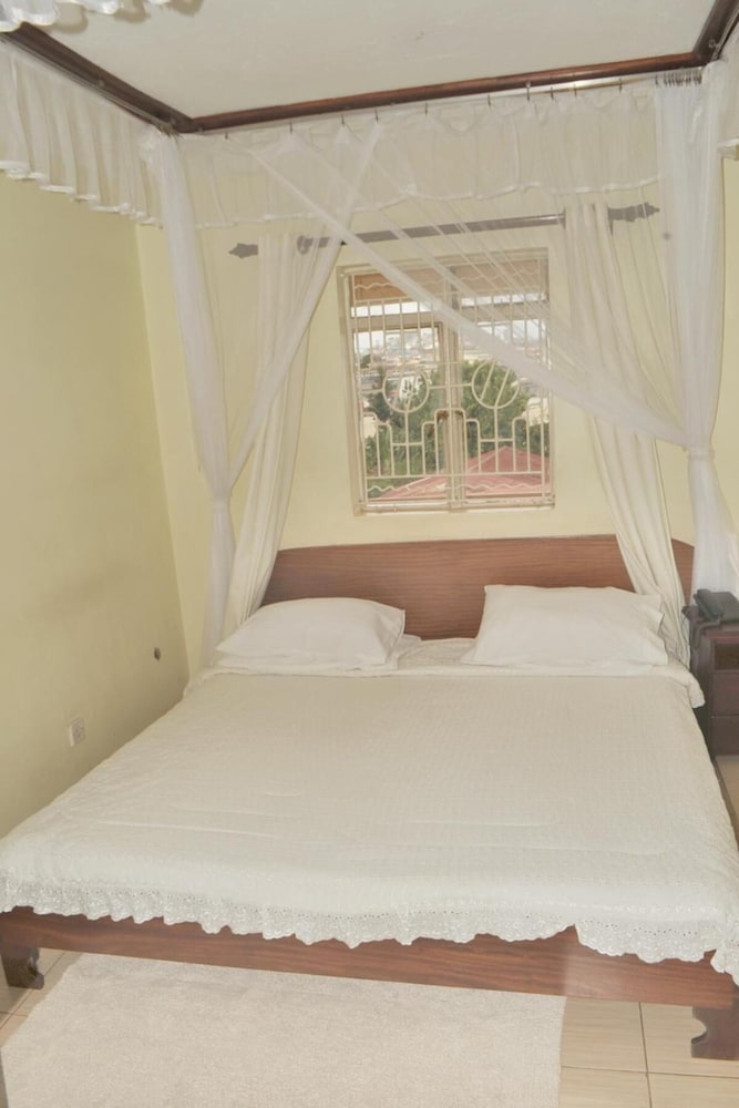 Фото New Scroll Inn Hotel