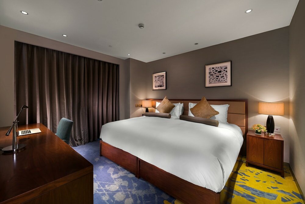 Фото Oakwood Hotel & Residence Suzhou