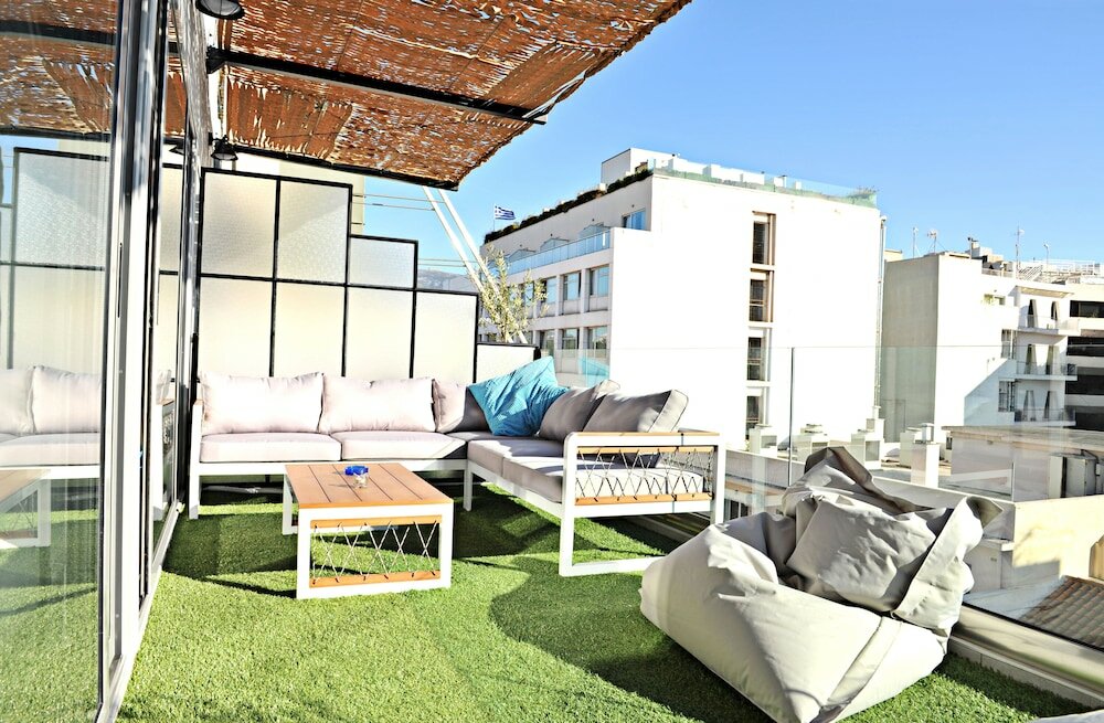 Фото The Athenians Art Apartments