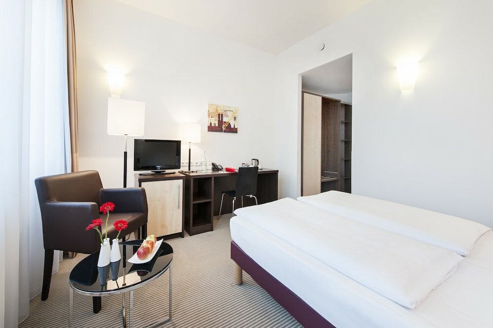 Фото Acom-Hotel Munich