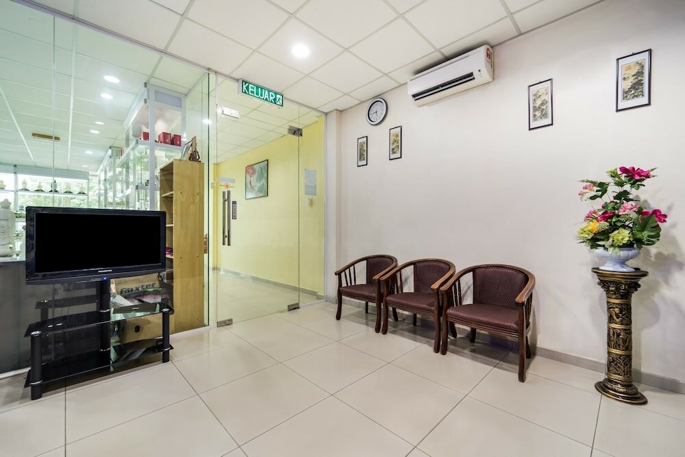 Фото Oyo 301 River Inn Hotel