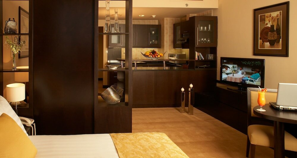 Фото Al Manzel Hotel Apartments