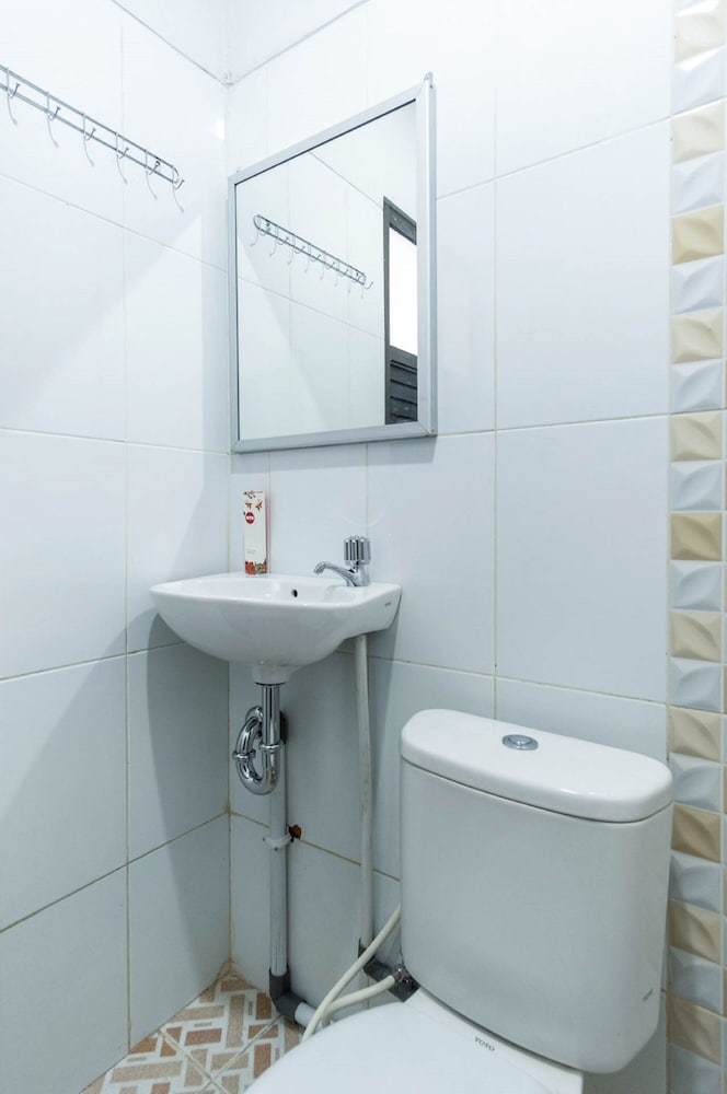 Фото Oyo 283 Helvetia Residence