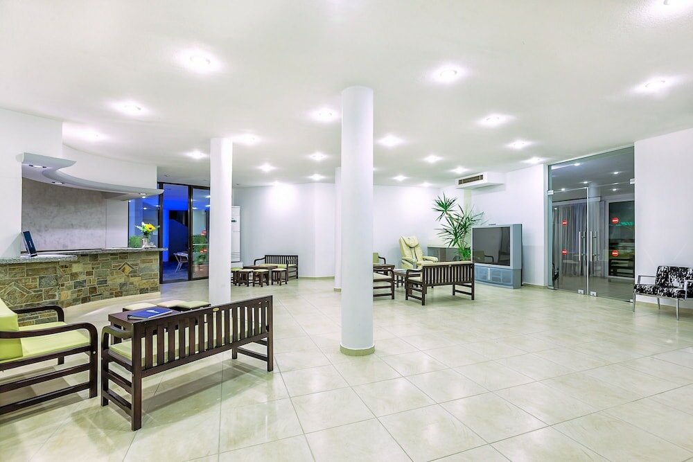 Фото Xenios Dolphin Beach Hotel