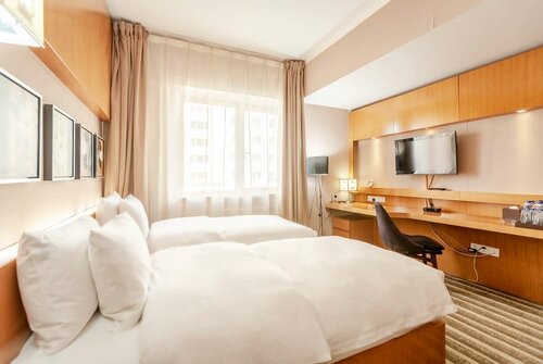 Внешний вид отеля Ramada by Wyndham Ulaanbaatar Citycenter в Улан-Баторе, фото 3