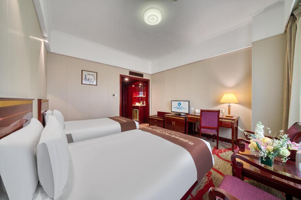 Фото Hangzhou Haiwaihai Communication Hotel