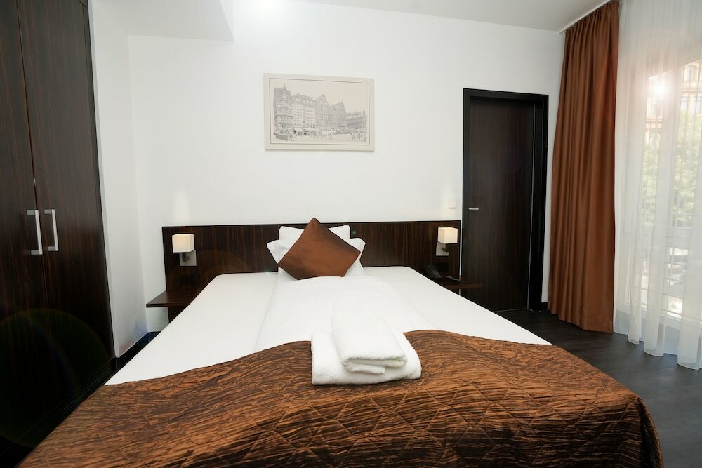 Фото The Atrium Hotel