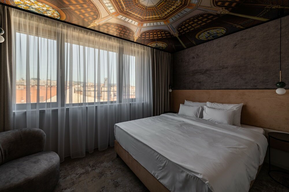 Фото Three Corners Downtown Hotel