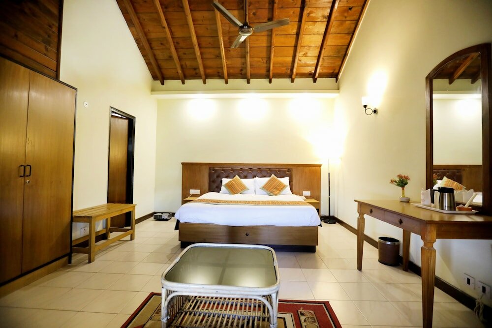 Фото Woodsvilla Resort