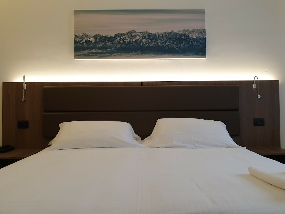 Фото Albergo Delle Alpi