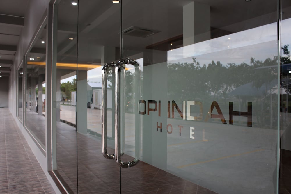 Фото Opi Indah Hotel