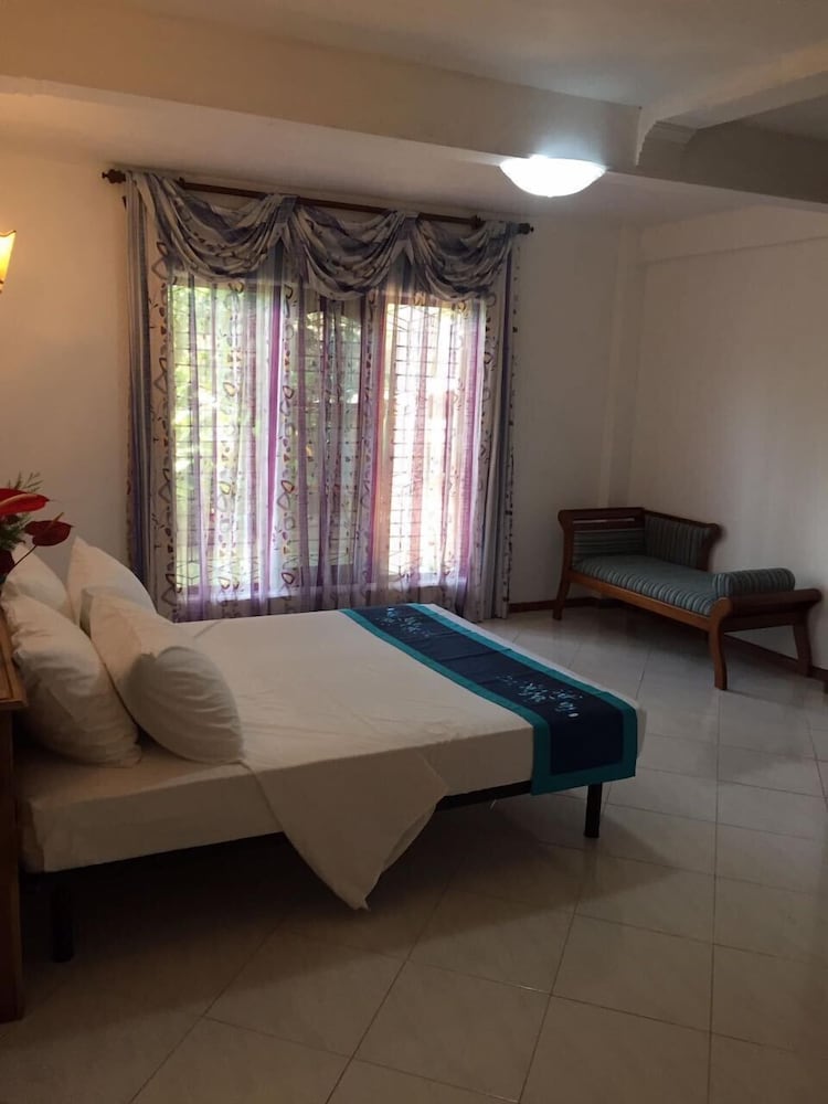 Фото Ka Mario Guesthouse