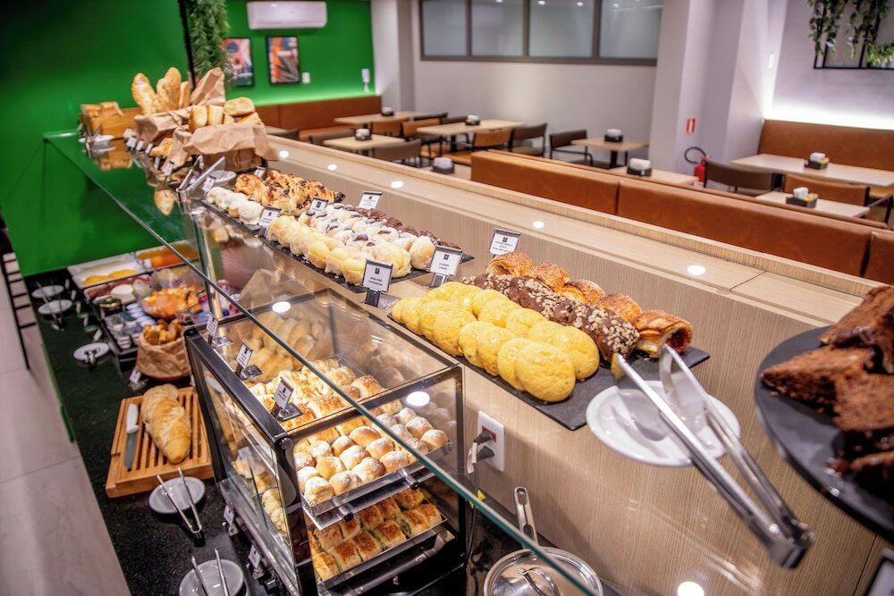 Фото Cozzy Suítes Paraíso Hotel