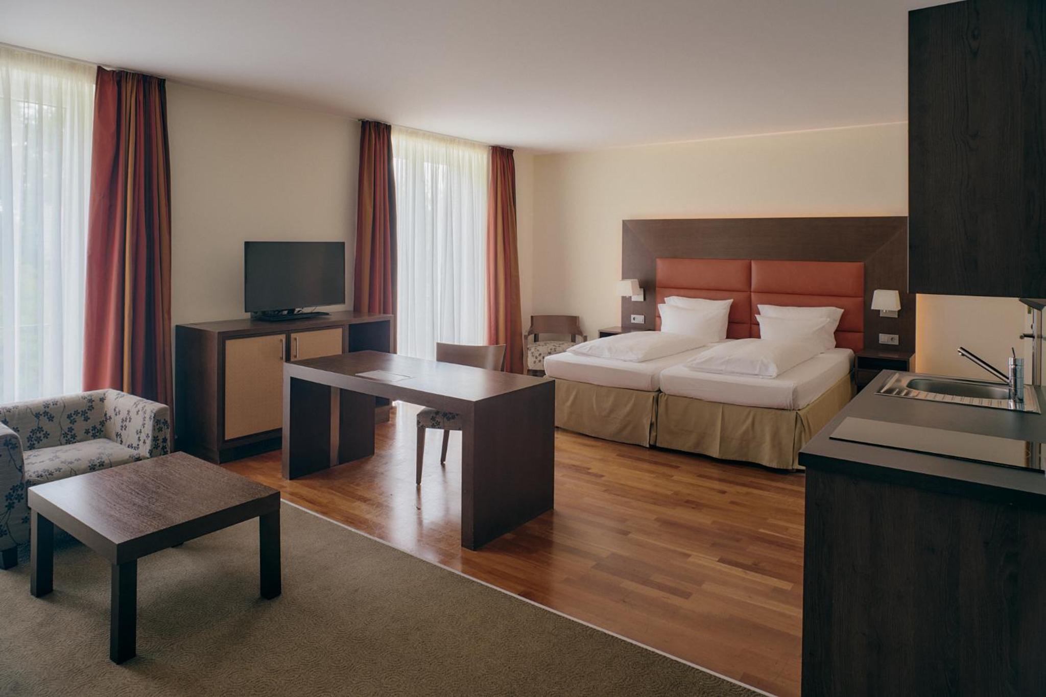 Фото Aparthotel am Golfclub Treudelberg