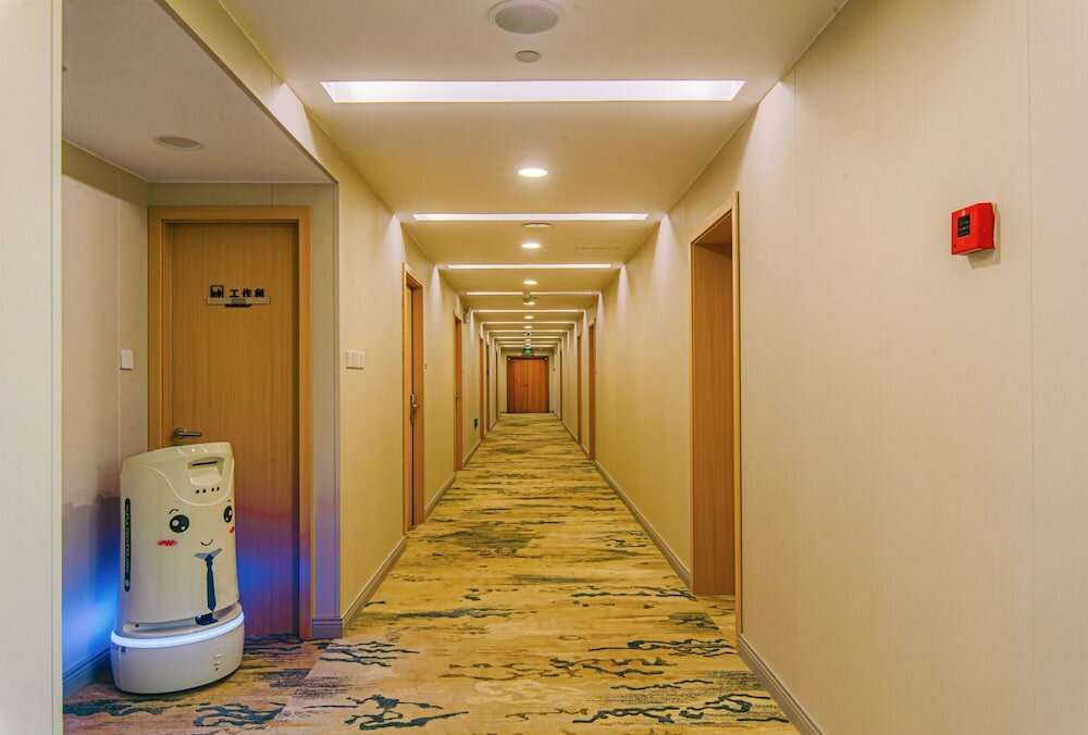 Фото Shanghai Joyful Yard Hotel