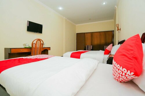 Гостиница Oyo 1652 Hotel Tampiarto в Проболинго