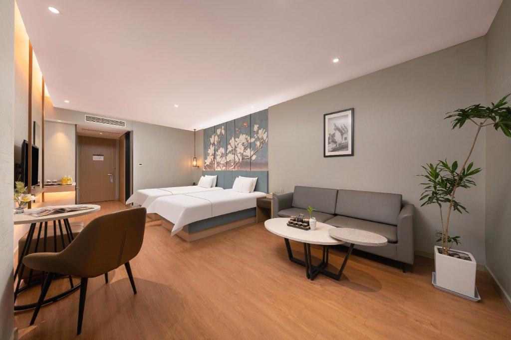 Фото Magnotel Jining Jiaxiang, Zengzi Avenue Hotel