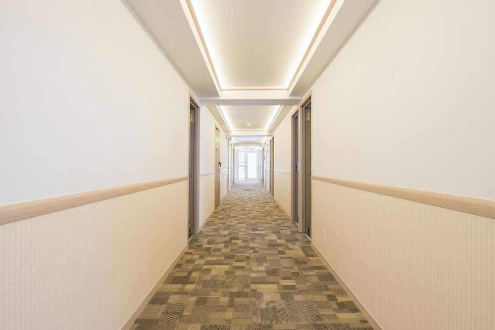 Фото Toyoko Inn Osaka Kadomashi Ekimae