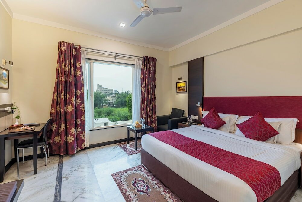 Фото Amantra Comfort Hotel