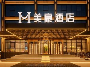 Mehood Hotel (40 meters southeast of the intersection of Xingguosi Street and Loufang Lane), hotel