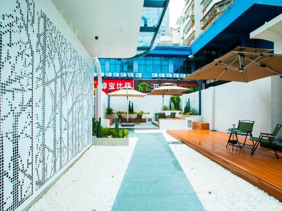 Фото Naive L Executive Apartments Coast City