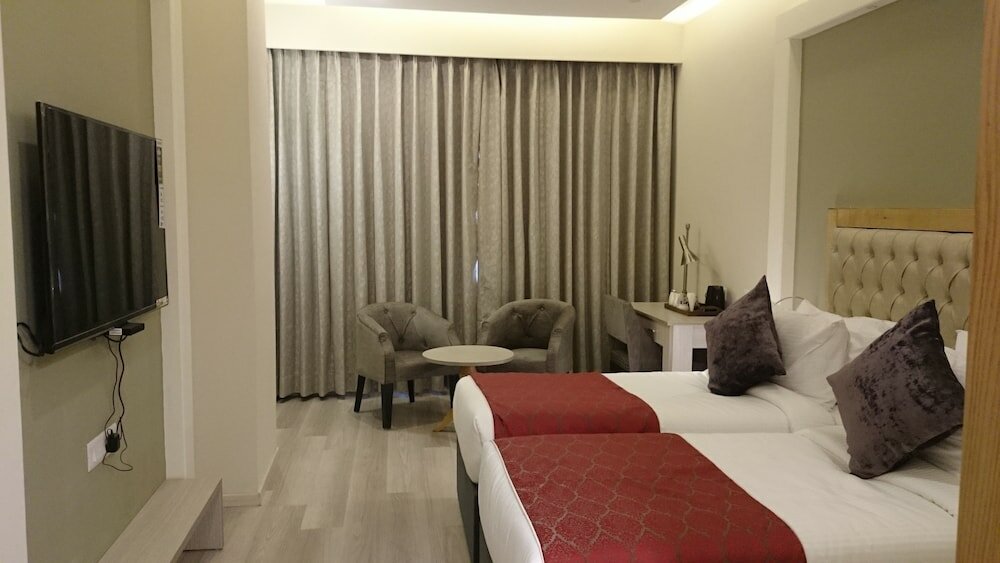 Фото Mango Hotels Naveen