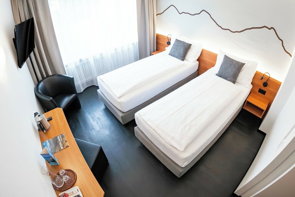 Фото Hotel Merkur Interlaken