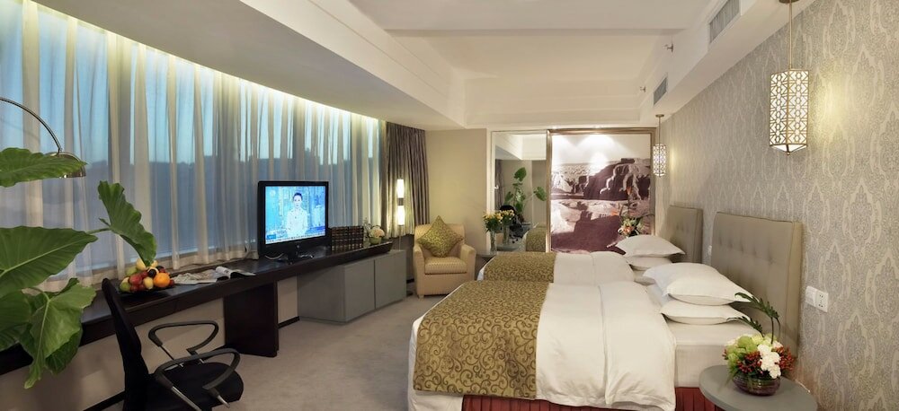 Фото Luxemon Xinjiang Hongfu Hotel