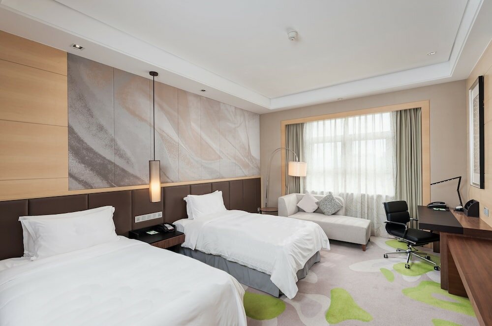 Фото Holiday Inn Qingdao Expo, an Ihg Hotel