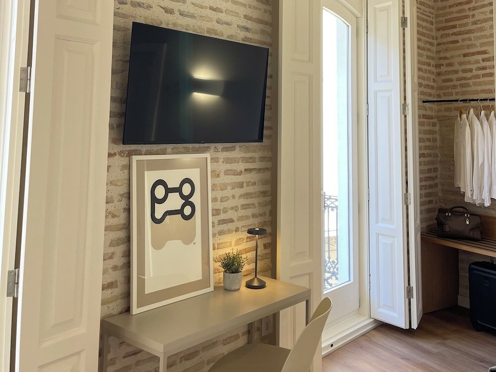 Фото Cosy Rooms Embajador