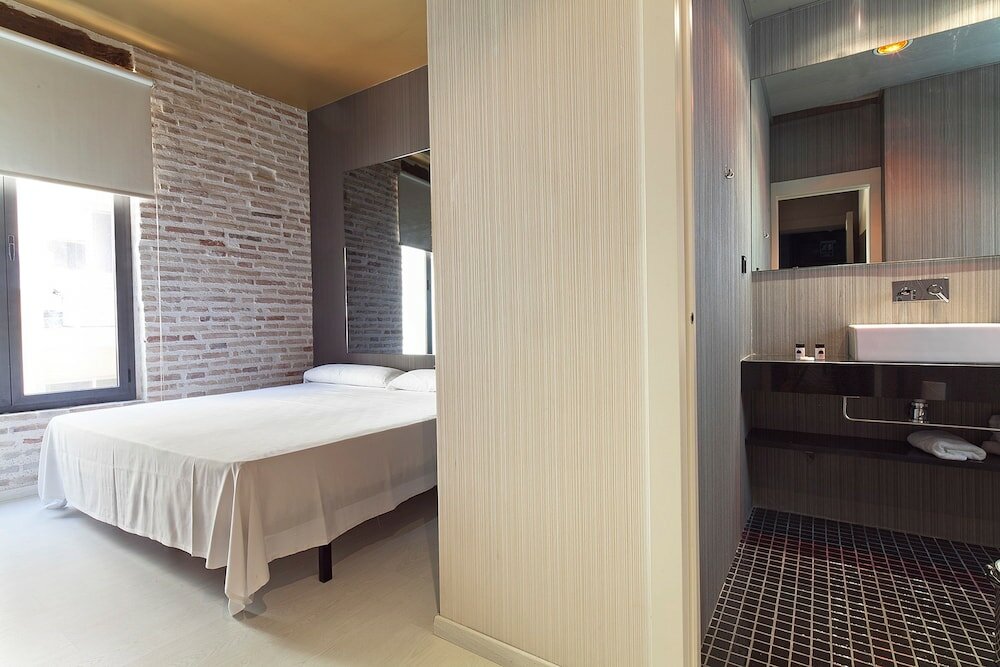 Фото Cosy Rooms Embajador