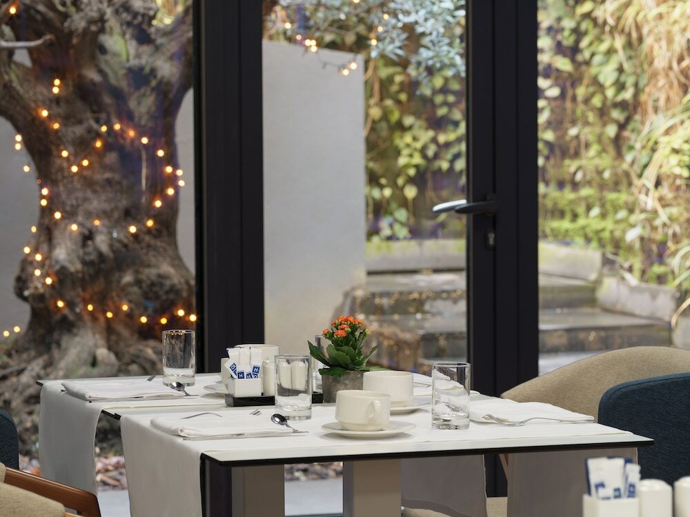 Фото H10 Urquinaona Plaza