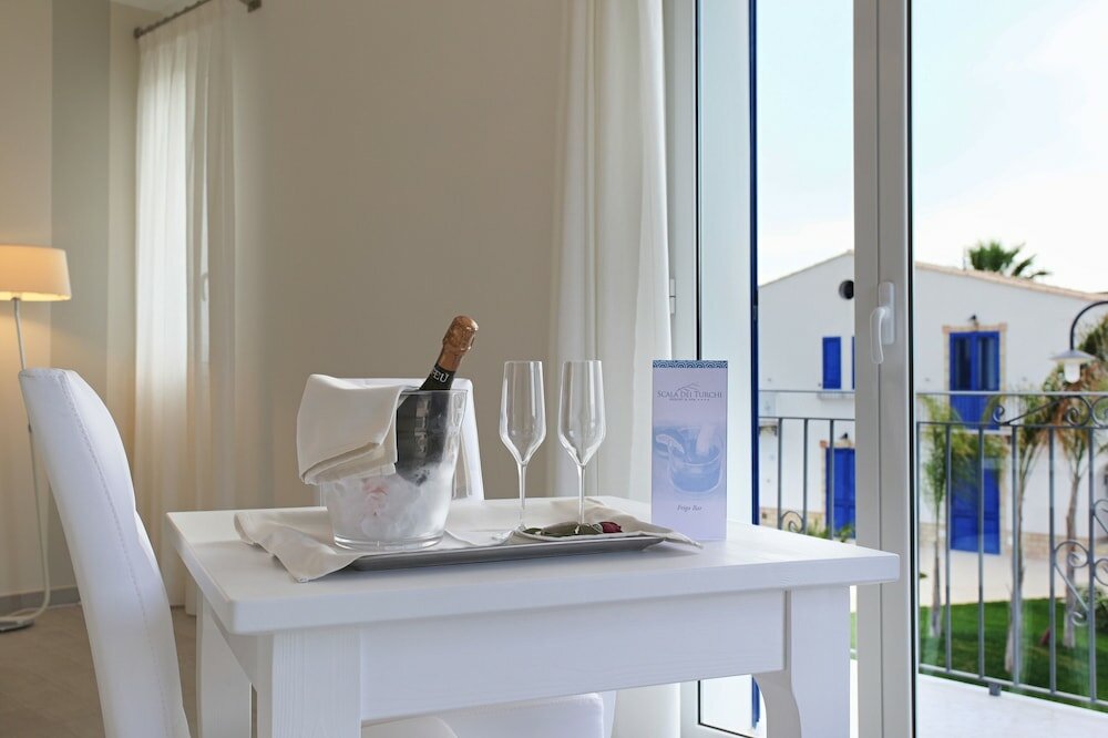 Фото Scala Dei Turchi Resort