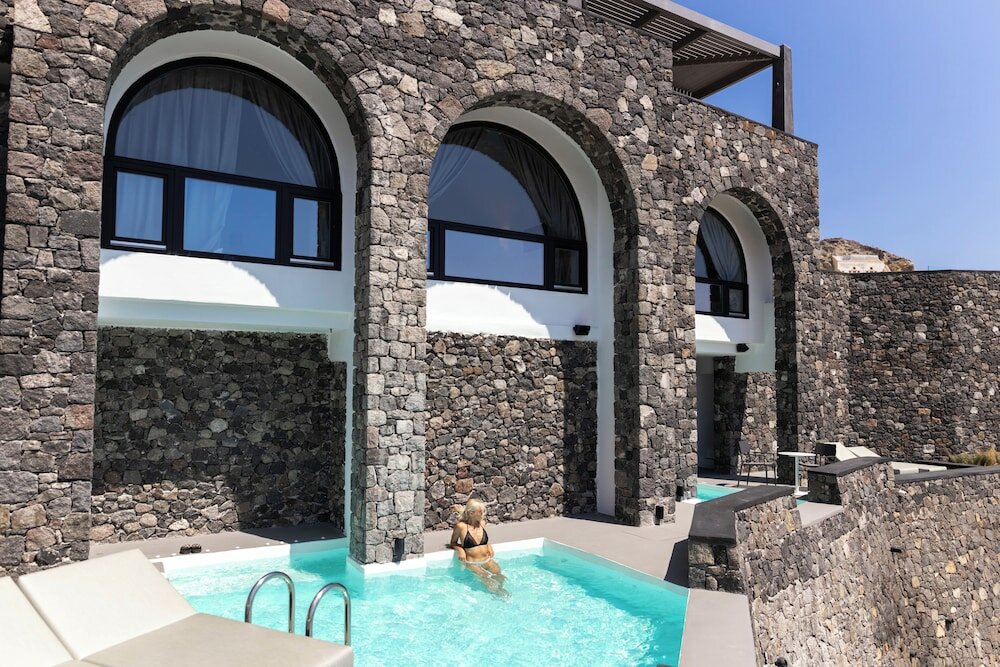 Фото Charisma Suites