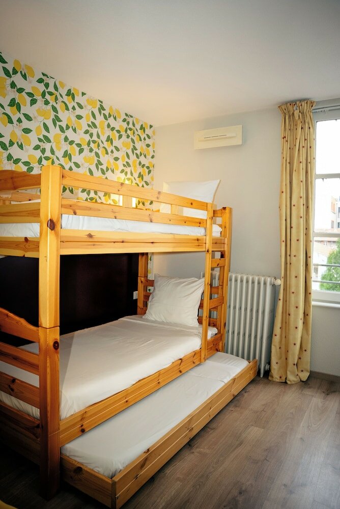 Фото Hôtel Les Commerçants