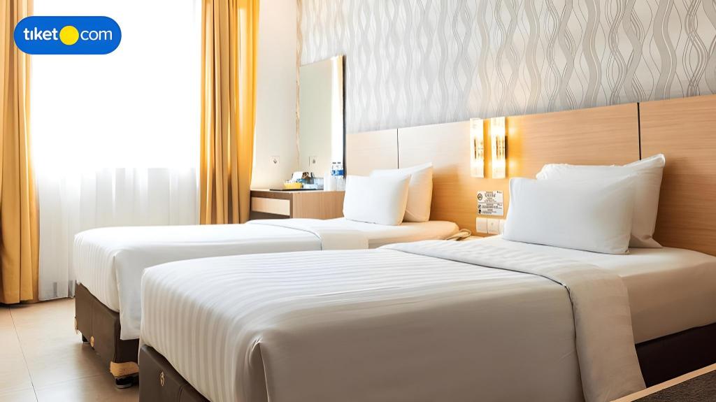 Фото Grand Impression Hotel Medan