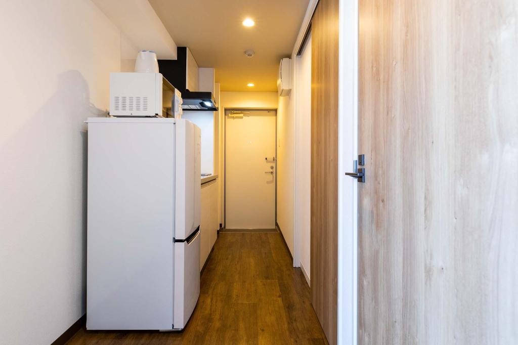 Фото Mr. Kinjo in front of Manza Beach