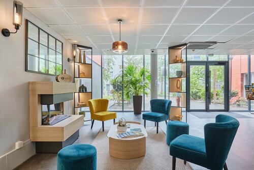 Гостиница Odalys City Apart'hotel Bioparc Lyon Est в Броне